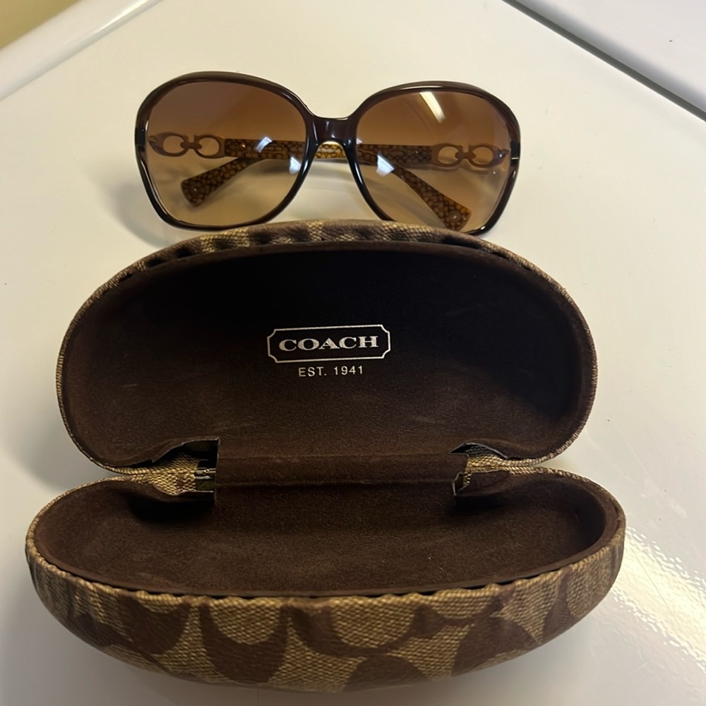 Coach sunglasses. Excellent used condition. No scratches brown tortoise frame.